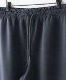 【BLUE STANDARD/ブルースタンダード】パフィースウェット バレルレッグパンツ ストレッチ 体型カバー 春服